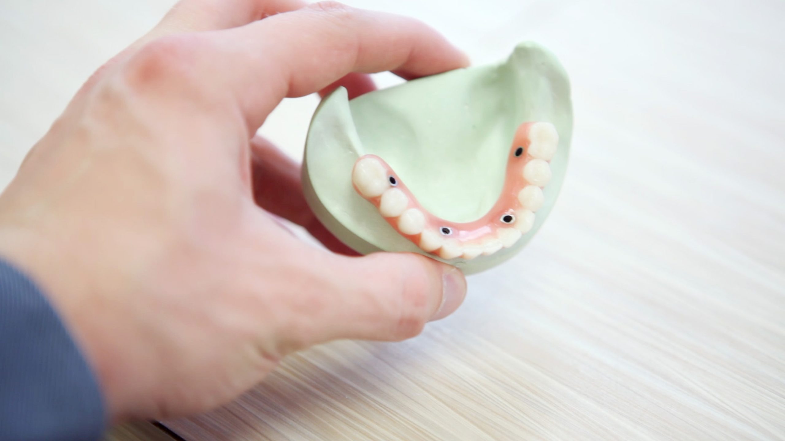 When teeth become sensitive, what factors contribute?